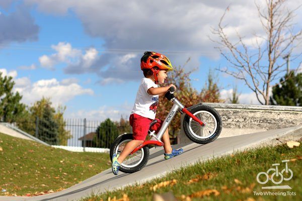 young child riding the likeabike jumper balance bike