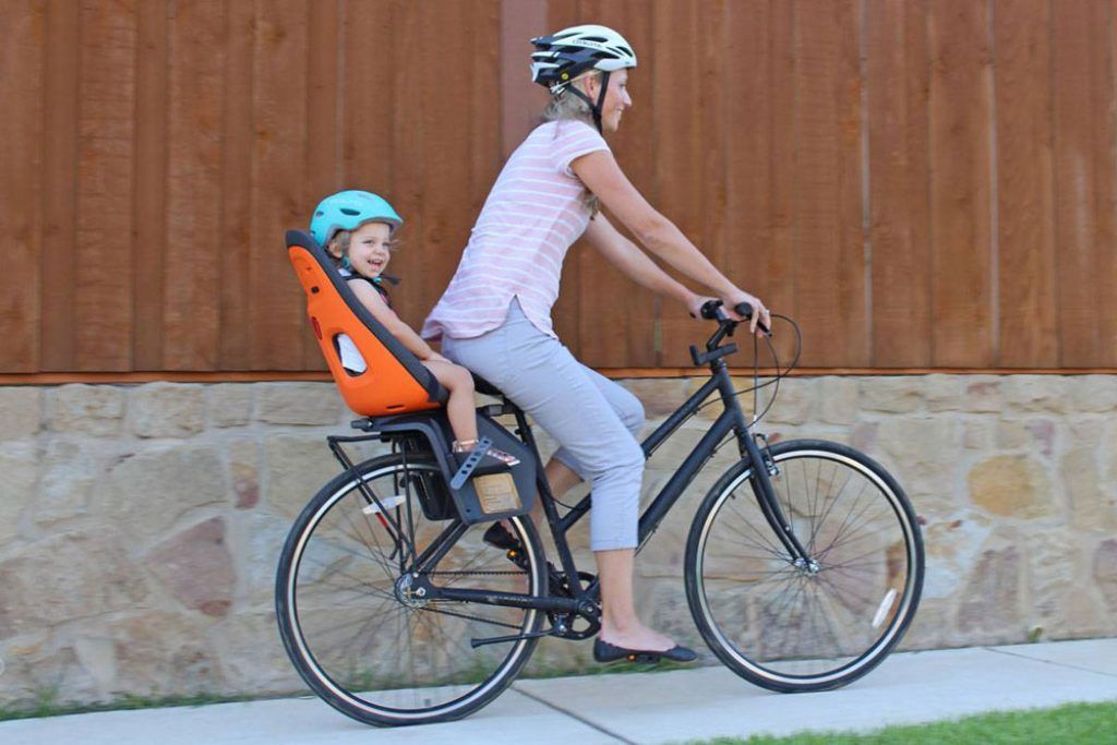 orange yepp nexxt maxi child bike seat in action