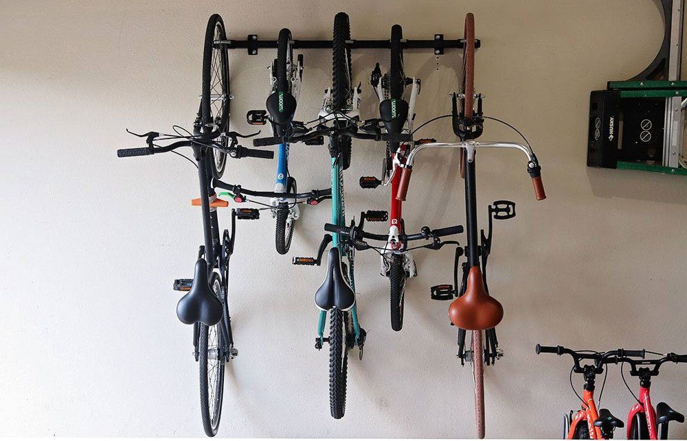 5 bikes mounted to the wall using the Omni Bike Storage rack