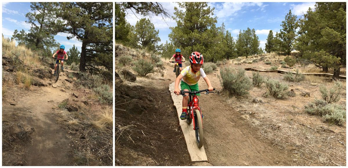 Kids riding mountain bikes down a mountain trail and over a split log bike park feature in Bend Oregon Bike Park.