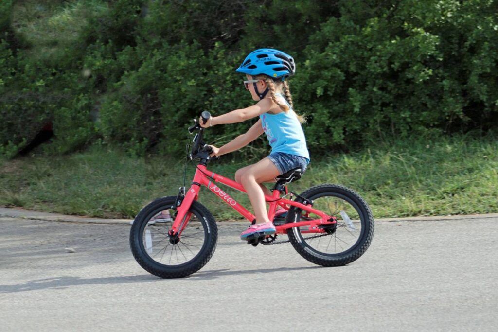 4 year old riding a pello revo 16 inch kids bike