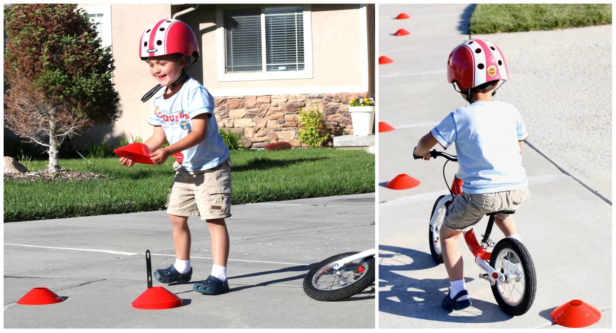 Toddler riding through a cone course on a balance bike