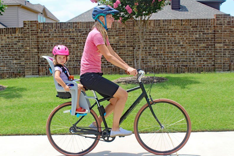Mom riding her bike with her daughter in Thule RideAlong child bike seat