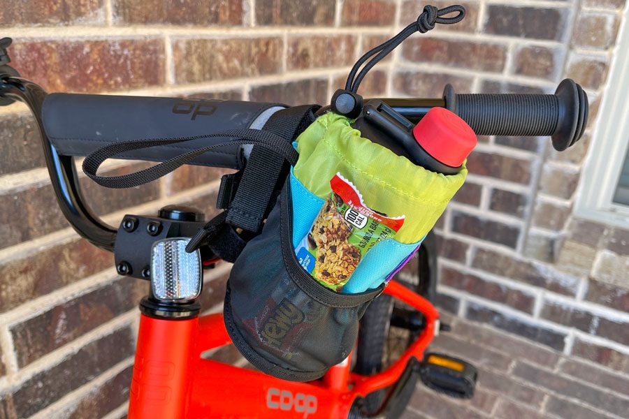 https://www.twowheelingtots.com/wp-content/uploads/2021/02/Kids-Bike-Water-Bottler-Holder-Pocampo-Bag.jpg