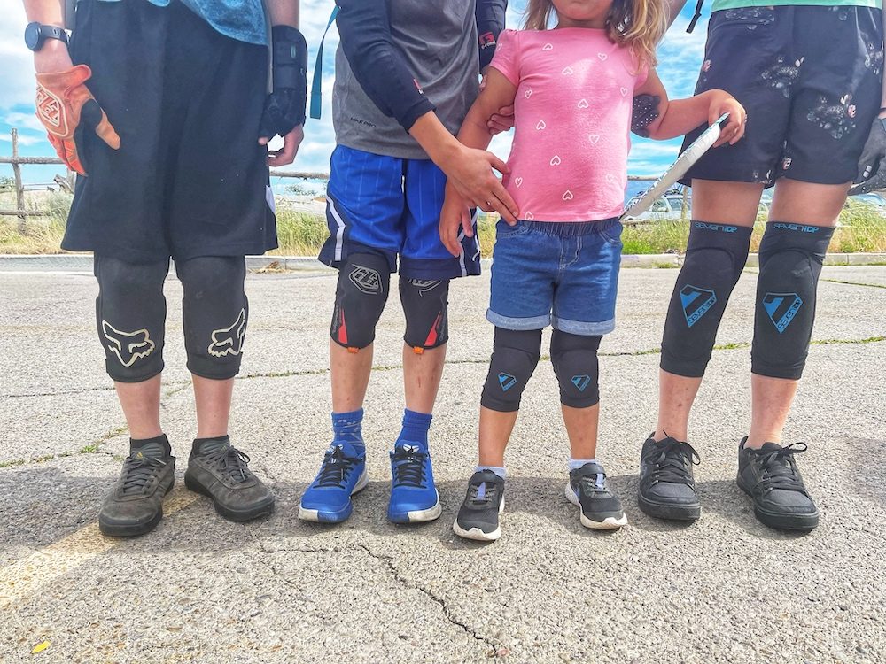 Group of kids ages 3 to 14 wearing kids knee pads