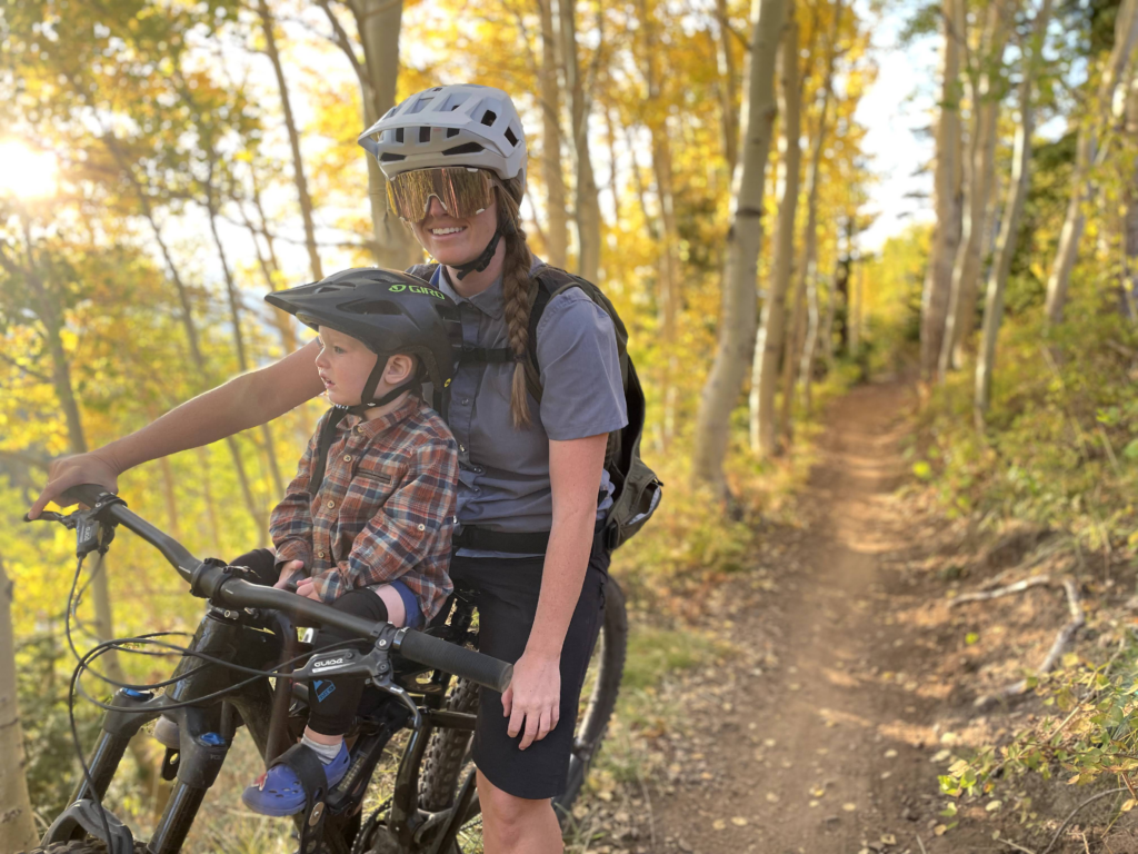 Mac Ride photo of mom and son mountain biking in the fall in Park City, Utah