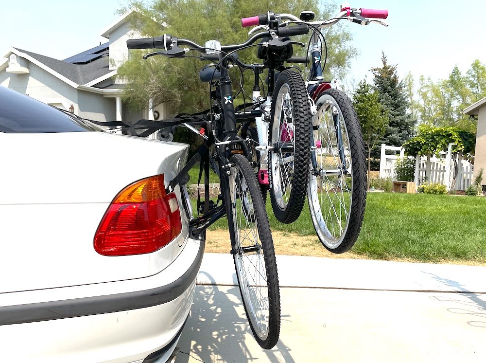 Allen Sports Deluxe trunk car rack loaded with bikes