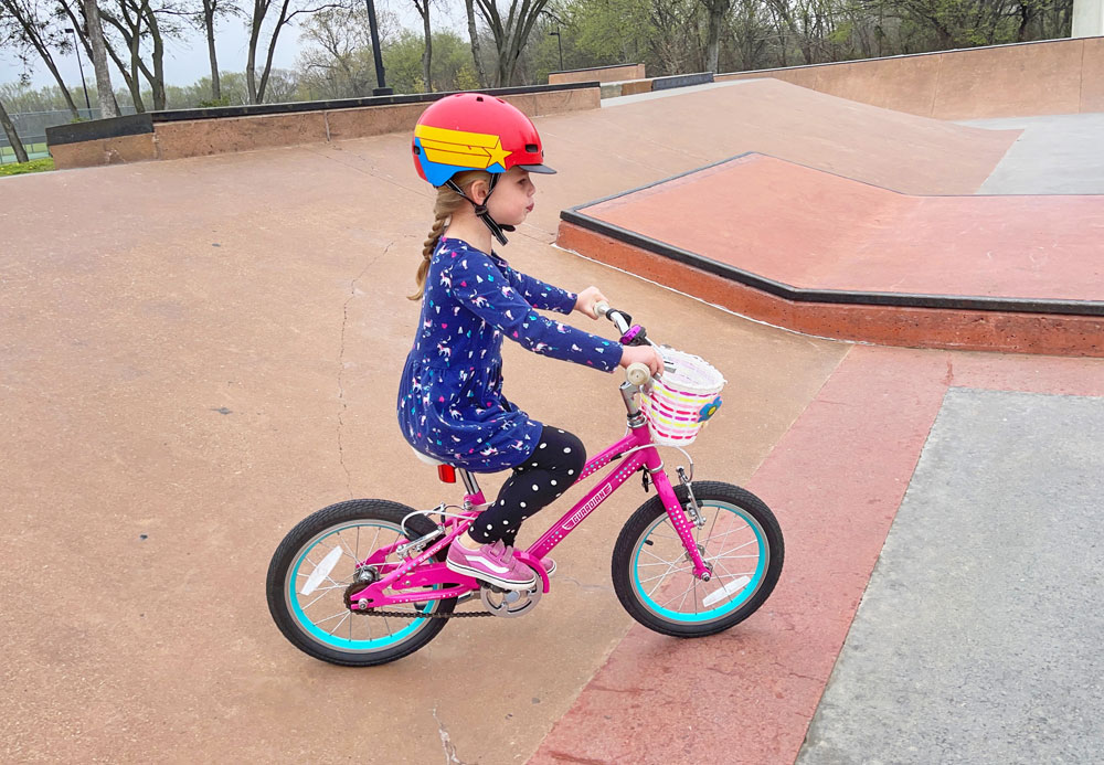 5 year old girl riding Guardian Ethos 16 inch bike at the skate park