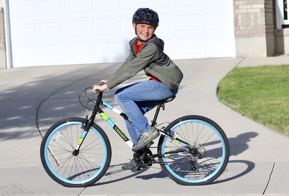 Young boy riding the guardian 24 inch bike