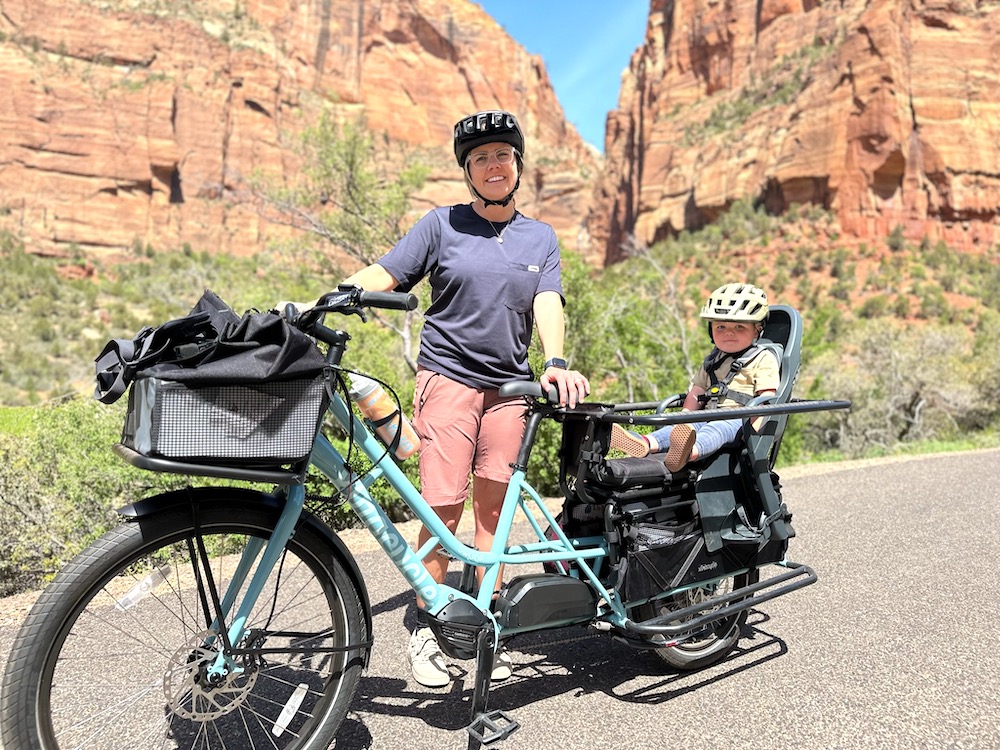 mom riding with her son on the Xtracycle Swoop in Zion National Park