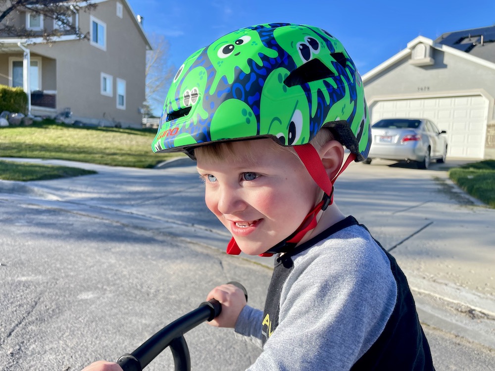 Toddler wearing a Giro Scamp II bike helmet