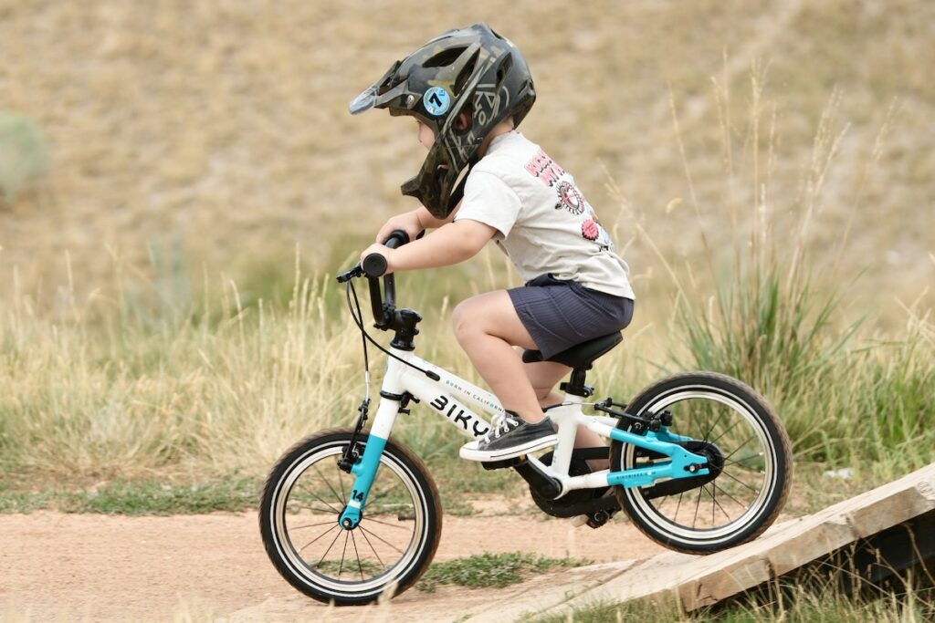 3 year old riding the biky air 14 at the bike park