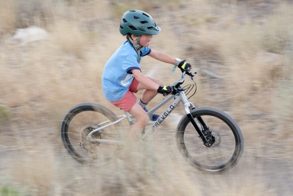 young rider on the Prevelo Alpha Three 20” pedal bike