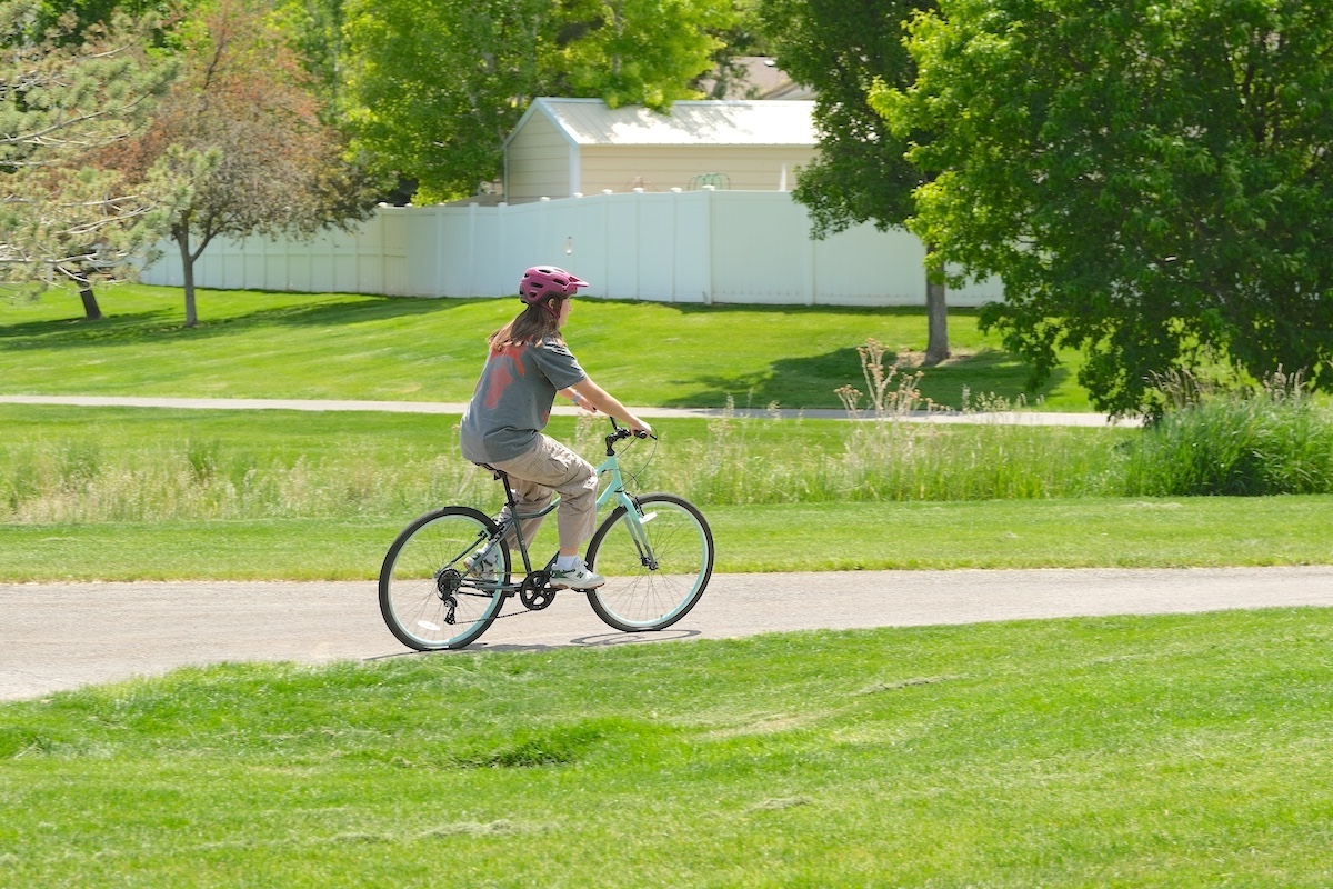 women riding and Guardian Adult bike size small