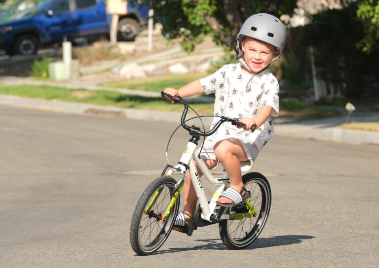 4 year old riding a biky air 16 inch bike